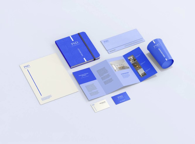 Free Four Fold Flyer With Business Stationery Mockup PSD