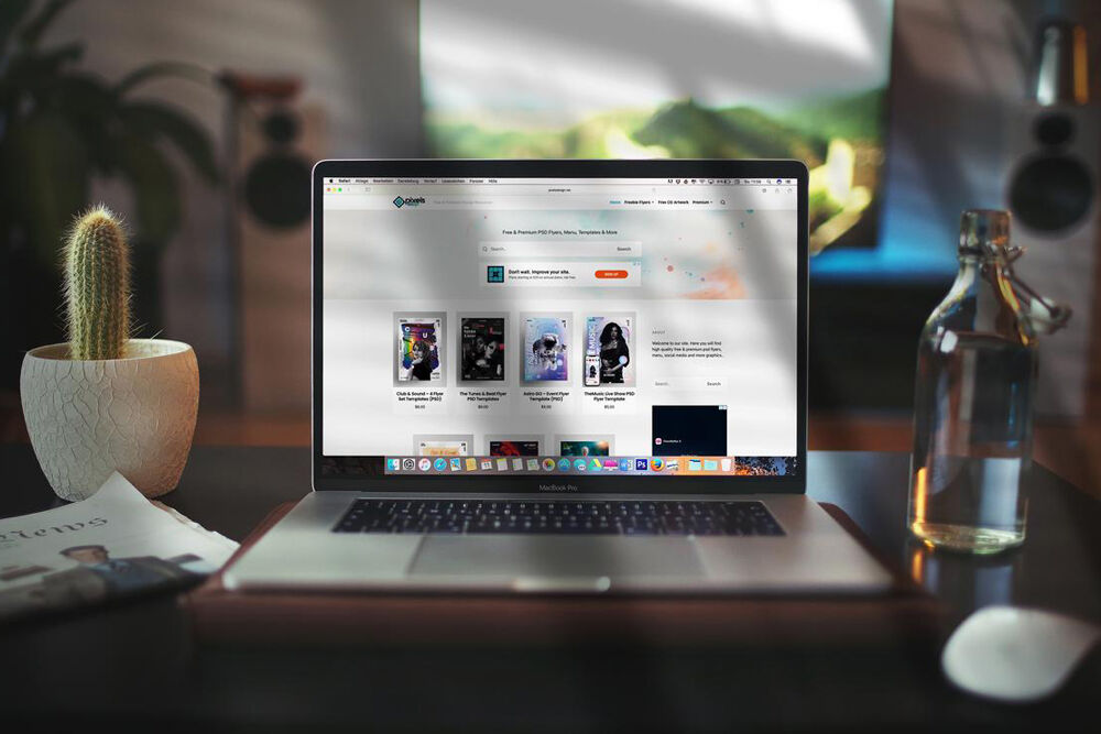 MacBook Pro Opened on Table in Front View Mockup FREE PSD