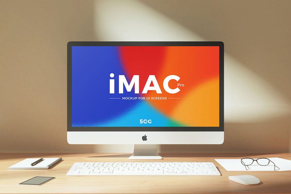 Free iMac Pro workspace PSD mockup for UI screens