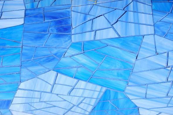 Mosaic texture on blue glass